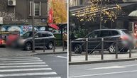Nadrealan snimak iz centra Beograda: Devojka džipom ide u rikverc trotoarom i parkira se u Skadarliju