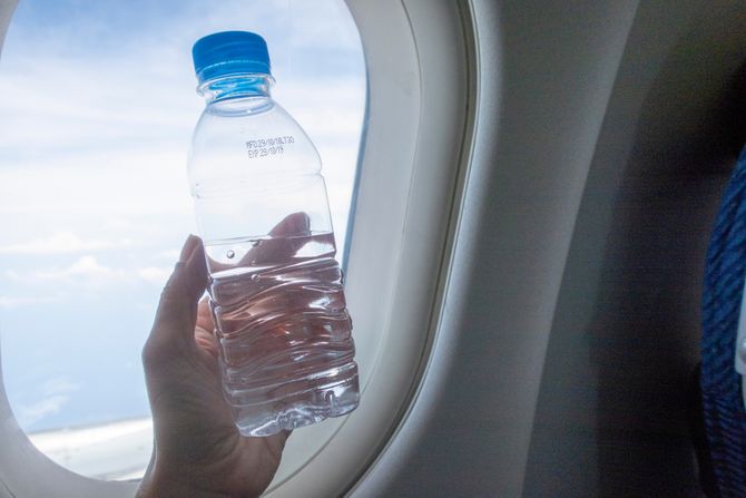 Avion putovanje, tečnost flaša Avion putovanje, tečnost flaša