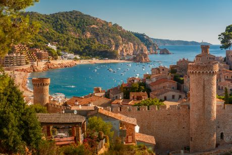 Fortress Vila Vella and Badia de Tossa bay at summer in Tossa de Mar on Costa Brava, Catalonia, Spain