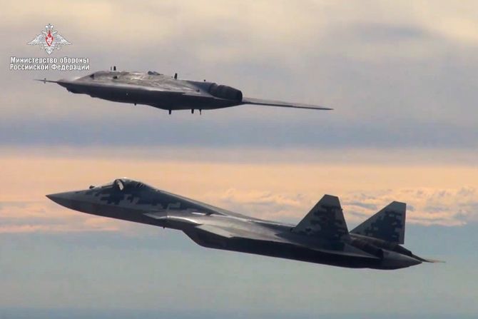 Sukhoi S-70 Okhotnik UAV and Su-57 jet fighter