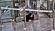 Video showing woman crawling under electronic gates at Belgrade airport appears online