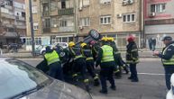 Filmska scena u centru Beograda! Saobraćajci i vatrogasci rukama prevrnuli auto sa krova nazad na točkove!