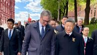 Serbian and Chinese presidents Vucic and Xi photographed in Moscow amid cordial conversation