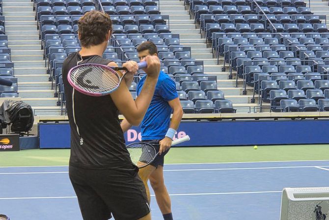 Novak Đoković i Tejlor Fric na razmeni na US Openu Novak Đoković i Tejlor Fric na razmeni na US Openu