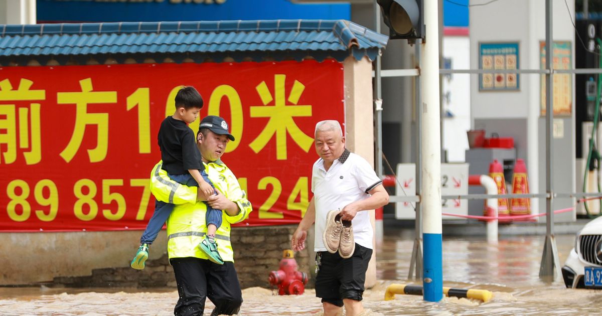 Cover image for At Least 25 Dead in Floods Across Central and Southwestern China