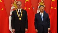 Vučić poklonio Siju staparski ćilim, porcelanski set i sliku Mome Antonovića