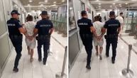 OVO ЈE OSUMNJIČENI TURČIN ZA UBISTVO RUSKINJE: Pripadnici UKP ga vode sa lisicama i pognute glave!