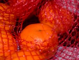 Mandarine u crvenoj mrežici
