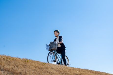 Japanese woman riding a bicycle